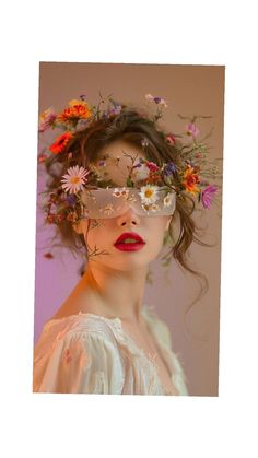 a woman with flowers in her hair and glasses over her eyes, wearing a white dress