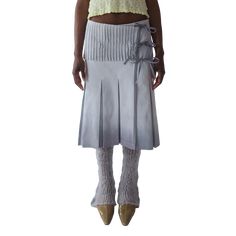 Designed and handmade in Toronto by CPW creator Alexandria Ferdinand. - Pleated crossover skirt with 3 tie closures - Features a pintuck top yoke & wide box pleat bottom - Hand-dyed with dip dye finish by the hem - Shown on a size small model - 100% cotton yarn In making a purchase, you are directly supporting smal Crossover Skirt, Tie Skirt, Dip Dye, Box Pleats, Pin Tucks, White Fabric, White Fabrics, Cotton Yarn, Pleated Skirt