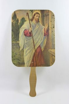 an image of jesus holding a stick in his hand