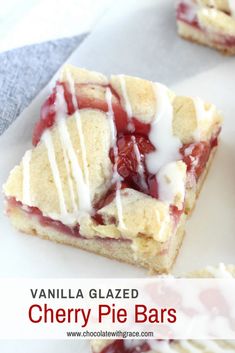 vanilla glazed cherry pie bars with icing on top