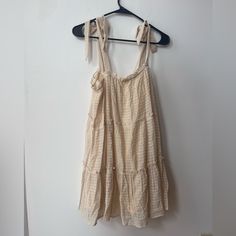 New With Tags, Size Medium Casual Beige Dress With Tie Straps, Casual Beige Dresses With Tie Straps, Chic Cream Dress With Tie Straps, Casual Beige Sundress With Tie Straps, Beige Tie-back Sundress For Day Out, Daytime Sundress With Tie Straps, Beige Day Out Dress With Tie Straps, Beige Tie Strap Dresses For Day Out, Beige Day Out Dresses With Tie Straps