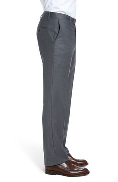 Stretch-infused wool gabardine defines handsome trousers crafted in a crisp, versatile flat-front cut. 16 1/2" leg opening; 9 1/4" front rise; 14 3/4" back rise Zip fly with button-tab closure Slant pockets; back button-closure welt pockets Unhemmed. These trousers can be hemmed for free at your local Nordstrom. Find a store Lined to the knee 98% wool, 2% spandex Dry clean Imported Men's Clothing Wool Suits With Straight Leg For Work, Wool Suits For Work With Straight Leg, Wool Suits With Straight Leg, Wool Flat Front Bottoms For Workwear, Flat Front Bottoms With Welt Pockets In Suiting Fabric, Tailored Full-length Suits With Welt Pockets, Classic Work Pants With Straight Hem For Office, Classic Office Work Pants With Straight Hem, Classic Straight Hem Work Pants For Office