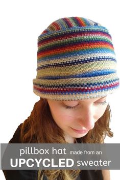 a woman wearing a striped hat with the words pillbox hat made from an upcycled sweater