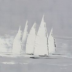 four sailboats are in the water with white sails and ice flakes on them