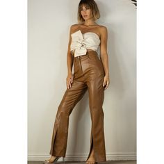 These brown faux leather pants with a stylish front slit are a must have for completing your fall outfits. Material and Care: Polyester, Cold hand wash with same colors. Brown Faux Leather Pants, Smooth Talker, Pants Large, Faux Leather Pants, Small Waist, Flare Pants, Must Haves, Leather Pants, Fall Outfits