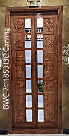 an ornate wooden door with glass panels