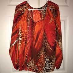 Very Pretty Multi Colored Animal Print Shirt Size L Fall Orange Tops With Vibrant Print, Red Tops With Vibrant Print For Fall, Casual Tops With Vibrant Print For Fall, Casual Long Sleeve Blouse With Vibrant Print, Red Printed Tops For Fall, Red Blouse With Vibrant Print For Fall, Casual Red Printed Blouse, Casual Red Shirt With Vibrant Print, Cheap Multicolor Print V-neck Tops