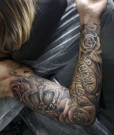 a man with a tattoo on his arm