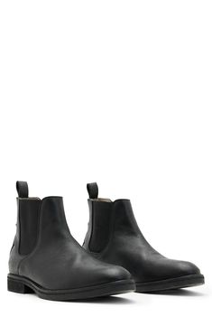 Elevate your closet staples with this sleek leather Chelsea boot featuring Western-inspired paneling at the heel and a rugged rubber sole. 5 1/2" shaft Lace-up style Leather and textile upper and lining/rubber sole Made in Portugal Black Work Boots With Rubber Heel Cap, Casual Leather Chelsea Boots With Snip Toe, Leather High Ankle Boots With Reinforced Toe, Leather Chelsea Boots With Vibram Sole For Work, Casual Leather Moto Boots With Rubber Heel Cap, Rugged Leather Chelsea Boots For Work, Casual Leather Boots With Rubber Heel Cap, Classic Moto Boots With Reinforced Toe For Work, Classic Waterproof Ankle Boots With Reinforced Heel