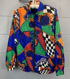 Vintage 1980s quilted windbreaker style jacket with a psychedelic Baroque vibe by Philippe Marques.  Lightly quilted front with gold beading detail.  Lined in royal blue Zip front.  Square collar.  Zip front.  Hip pockets.  Elastic cuffs and waistband.  Excellent vintage condition. No noted flaws. No fabric content. Feels like polyester or maybe nylon.  No size tag. Fits most like a modern Large. Please use measurements to decide if the fit works for you. Garments are laid flat and measured.  Sh Luxury Multicolor Retro Outerwear, Luxury Vintage Multicolor Outerwear, Plus Size Goth Fashion, Art Trippy, Boho Jeans, Concept Clothing, Denim Midi Skirt, Beautiful Skirts, Optical Illusion