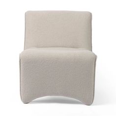 an upholstered chair with a curved back and legs, made from wool fabric