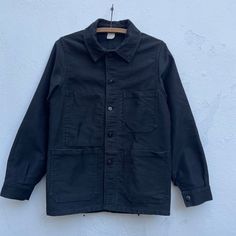 "Stunning black moleskine chore jacket by cult French brand Le Laboureur, in a rarer smaller size, pit to pit 19\", equivalent to XS menswear and UK8/10 womenswear (French 38). 3 patch pockets, 1 inner pocket. 5 front buttons. Round collar. Great worn and barely faded condition (although the actual black colour is deeper than the pictures), lovely label inside the right chest. Pit to pit 19\" (48cm) Chest 38\" (96cm) Sleeve: shoulder to cuff 24\" (61cm) Shoulders 15\" (38cm) Back Length 27\" (68 Fitted Cotton Utility Jacket For Streetwear, Black Cotton Outerwear With Patch Pockets, Pre-washed Fall Outerwear For Work, Fall Pre-washed Outerwear For Work, Vintage Unstructured Outerwear For Everyday, Everyday Vintage Unstructured Outerwear, Unstructured Vintage Outerwear For Everyday, Washed Black Cotton Outerwear With Pockets, Cotton Outerwear With Pockets In Washed Black