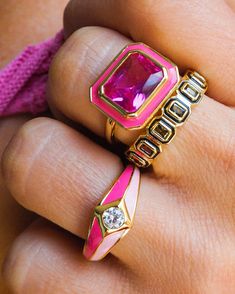 Edged metal signet ring with a single round CZ stone and hot pink + baby pink enamel 8.5mm x 2.5mm Made from Brass with CZ Stones Plated Gold Available in US ring sizes 5, 6, 7 Ring is 100% nickel-free and cadmium-free 1 year warranty Packaged in Luv Aj branded gift boxes Chic Wedding Ring, Pink Rings, Statement Engagement Ring, Stone Plate, Black Gold Ring, Ring Trends, Pink Enamel, Branded Gifts, Enamel Ring