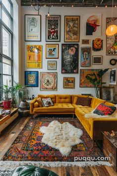 a living room filled with furniture and lots of pictures on the wall above it's windows