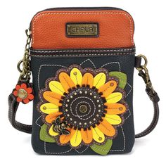 Inspire joy and positivity everywhere you go with our Sunflower Cell Phone Xbody! No matter the weather, the striking yellow and orange faux leather petals guarantee sunshine is always within arms’ reach. This bag can be a purse, a crossbody bag, or even a pouch! Materials: Faux Leather Dimensions: 5" x 7.5" x 1" Strap adjustable: 7"-30" Exterior: Cell phone can fit in front pocket or interior 2 Adjustable straps that are detachable Top zipper closure Unique zipper pull Interior: Soft fabric lin Chala Handbag, Vans Backpack, Crossbody Phone Purse, Organic Kids Clothes, Cell Phone Bag, Cell Phone Purse, Phone Purse, Phone Bag, Cross Body Handbags