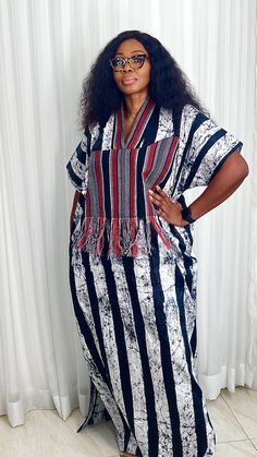 This Adire Ankara Silk Kaftan maxi dress is made with Polysilk. It can be styled in different ways, you can dress it up with high heels or dress down with flats/sneakers. The Hand can be worn in 2 ways. one ways shows off the arm, the 2nd way has the arm covered for modesty. Notice the slits.Other prints are also available, kindly start a conversation to ask for more information and pics.Contact us for custom looks and more style options. Sizing 🌺 Your height or desired kaftan length is needed. It is a free size but we still require your US/UK size and the length , and it can be adjusted/custom made depending on your height. (please indicate your size and height when you order).🌺 It is easy to wear, comfortable, and very stylish. Please do the following before completing your order; ✅ Wr Striped Ankara Styles, Bubu Gown Styles With Material, Adire Styles For Ladies 2024, Silk Material Styles, Ankara Bubu Gown Styles 2024, Bubu Gown Styles Ankara Bubu Gown Styles, Kampala Styles For Ladies, Adire Kaftan Styles, Adire Styles For Ladies