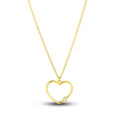 A meaningful traced heart is punctuated with a shimmering round diamond in this sentimental women's pendant necklace. Fashioned in 14K yellow gold, the 18-inch cable chain secures in place with a lobster clasp. Anniversary Yellow Gold Heart Necklace With Cable Chain, Yellow Gold Heart Necklace With Cable Chain For Anniversary, Gold Heart-shaped Diamond Necklace With Single Diamond, Gold Heart Pendant Necklace With Single Diamond, Gold Heart Necklace With Single Diamond, Gold Heart Cut Single Diamond Necklace, Gold Necklace With Single Diamond Heart Pendant, Gold Necklace With Heart Cut Single Diamond, Gold Necklaces With Single Diamond Heart Cut