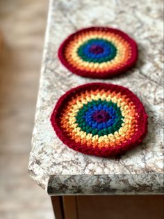 2 circular handmade rainbow crochet coasters with a mug sitting on one of them Rainbow Coasters, Mason Jar Cozy, Crochet House, Pride Flag Colors, Rainbow Crochet, Rainbow Aesthetic