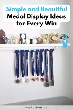 some medals are hanging on a wall above a fireplace with the words, simple and beautiful medal display ideas for every win