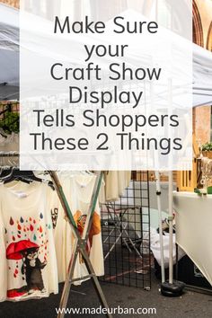 an outdoor market with clothes on display and the words make sure your craft show displays shoppers these 2 things