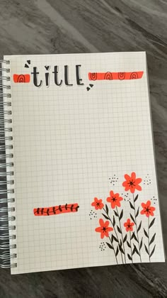 a notebook with writing and flowers on it