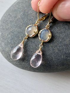 Rose Quartz and Gray Moonstone Earrings, Blush Pink Dangle Gold Earrings, Delicate Two Stone Drops Earrings, Elegant Gift for Girlfriend These blush elongated drop earrings feature gray moonstone hexagonal stones framed in 14k gold filled and suspended from them are micro faceted pastel pink rose quartz teardrops, wire wrapped in 14k Gold Filled. The Earrings are suspended from gold filled lever back ear wires. These are ideal for a night out, they are a great choice for causal wear and they wil Pink Rose Quartz Drop Earrings, Elegant Nickel-free Rose Quartz Earrings, Elegant Teardrop Rose Quartz Earrings, Elegant Rose Quartz Drop Earrings, Rose Quartz Gemstone Dangle Earrings, Rose Quartz Gemstone Drop Earrings, Rose Quartz Teardrop Earrings For Gift, Rose Quartz Drop Earrings For Jewelry Making, Rose Gold Rose Quartz Drop Earrings