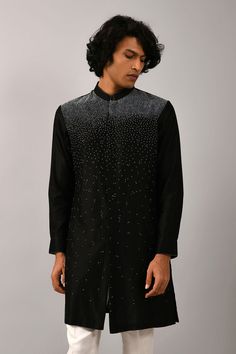 Black short kurta with all-over thread work. Comes with ivory cotton pants.
Components:2
Embroidered
Neckline:Mandarin Collar
Sleeve Length:Full
Fabric:Chanderi, Cotton
Color:Black


Cuff sleeves
Closure: Kurta: Concealed front placket - Aza Fashions Kurta Set For Men, Short Kurta, 2022 Wedding, Nehru Jackets, Jumpsuit Skirt, Embroidered Neckline, Fashion App, Thread Work, Kurta Set