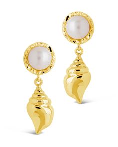 Elevate your style with our Beverly Drops Studs. These exquisite drop earrings feature a delicate combination of shells and pearls, creating a luxurious accessory that will effortlessly elevate any outfit. Make a statement of elegance and sophistication with the Beverly Drops Studs. Material: 14K gold or rhodium plated brass, freshwater pearls Features: 1.2" drop, 0.45" stud, 0.75" charm, 8mm pearls, Lead & Nickel free, post back Shells And Pearls, Solid Gold Bracelet, Solid Gold Earrings, Statement Drop Earrings, Mens Accessories Jewelry, Men Earrings, Pearl Shell, Free Post, Earring Sale