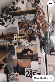 a refrigerator covered in pictures and magnets next to a shelf filled with other items