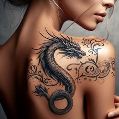 a woman with a dragon tattoo on her back