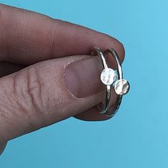 "This listing is for one delicate, hammered silver ring, size 7.25 or 8 US.  Please specify ring size at checkout. Each ring has a little hammered silver disc soldered to the ring. Each disc is approximately 3/16\" in diameter." Minimalist Hammered Sterling Silver Midi Rings, Hammered Sterling Silver Midi Rings, Minimalist Hammered Silver Stackable Rings, Everyday Hammered Sterling Silver Stackable Rings, Silver Hammered Minimalist Midi Rings, Everyday Adjustable Hammered Stackable Rings, Dainty Hammered Stackable Open Rings, Dainty Hammered Open Stackable Rings, Simple Hammered Rings