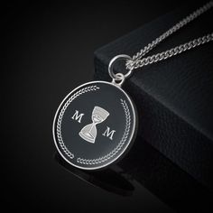 STOIC MEMENTO MORI PENDANT NECKLACE SILVER AND BLACK ENAMELMemento Mori is one of the key teachings in Stoic Philosophy. Literally meaning “Remember You Must Die”, this message at first appears morbid but is in fact one of the most grounding messages that Stoicism has to offer.Memento Mori is a reminder that there is an expiry date to all of this. We aren’t going to be here forever and neither are those that are closest to us. Remembering this makes us less likely to waste this life that is so p Handmade Skulls, Silver Background, Skull Necklace, Necklace Box, Black Necklace, Memento Mori, Black Enamel, Men Necklace, Dog Tag Necklace