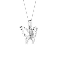 This Butterfly Flutter Silhouette Pendant features a delicate butterfly silhouette, intricately carved in shimmering gold. The heart of this diamond pendant necklace is adorned with brilliant diamonds. Its timeless design ensures it complements any style, whether worn with casual attire or dressing up for a special occasion. White Gold Butterfly Necklace With Cubic Zirconia, Diamond Butterfly Necklace In Fine Jewelry Style, Diamond Pendant Necklace With Butterfly Charm, Formal Diamond Butterfly Necklace With Charm, Fine Jewelry Butterfly Necklace With Diamond Accents, Diamond Butterfly Necklace With Diamond Accents, Fine Jewelry Butterfly Shaped Diamond Necklace, Diamond Necklace With Butterfly Charm For Anniversary, Butterfly Silhouette