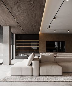 a modern living room with white couches and wooden ceilinging, along with an area rug on the floor