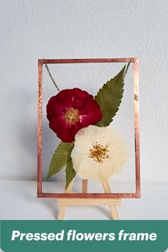 Rectangular stained glass panel with pressed roses and copper frame.