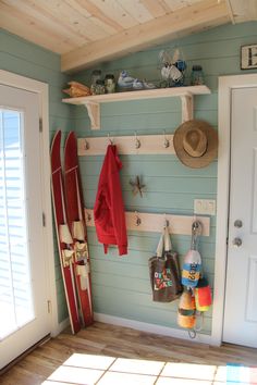 there is a surfboard and other items on the wall