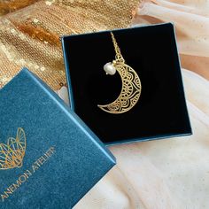 "Looking for a stunning piece of jewelry that will capture the beauty of the moon? Discover the elegance of our Filigree Moon necklace - a stunning gold piece featuring intricate open work  design. Shop our exquisite jewellery today! This Moon Necklace is the perfect way to stay connected to the moon's cycles no matter where you go. ♡ DETAILS  necklace: 2.8 cm-1.1\" Material:  sterling silver 925 or gold plated, natural pearl Chain Lenght please choose The jewelry is made entirely of 925 sterlin Crescent Jewelry With Intricate Design, Elegant Half Moon Jewelry With Delicate Chain, Elegant Sun And Moon Design Jewelry As Gift, Elegant Sun And Moon Design Jewelry For Gifts, Elegant Sun And Moon Design Jewelry Gift, Elegant Moon Shaped Yellow Gold Necklace, Gold Plated Filigree Jewelry As Gift, Elegant Moon Charm Pendant Jewelry, Elegant Necklace With Moon Charm In Half Moon Shape