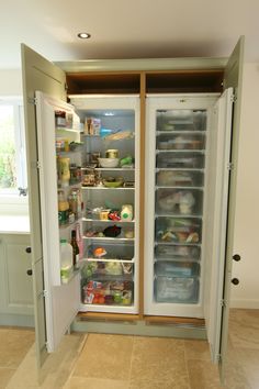 an open refrigerator with its door wide open