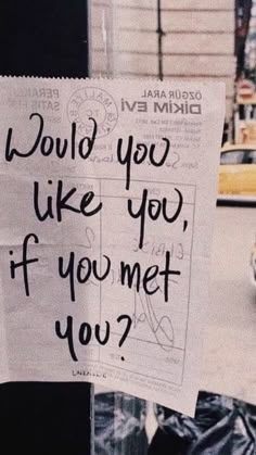 a person holding up a sign that says would you like you if you met you?