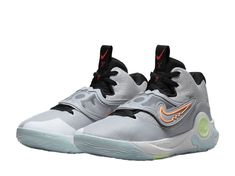 the nike zoom basketball shoe in grey and orange