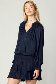 This tie-neck mini dress is the perfect choice for occasions ahead. full length sleeves frame the languid drape of the bodice, while the twirl-ready tiered skirt adds plenty of movement. •On average, customers say it fits large •Split neckline with smocking •Adjustable tie detail •Ruffle trim •Elastic drop waist •Pleated tiered skirt •Relaxed fit DIMENSIONS •Standard: 34.75" L Item number 1690963100% Polyester Hand wash cold Imported Pleated Mini Dress, Rayon Dress, Tiered Skirt, Tie Neck, Waist Dress, Drop Waist, Three Quarter Sleeves, Quarter Sleeve, Pleated Dress