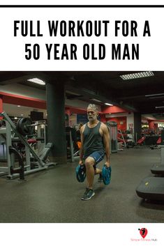 a man is squatting down in the gym