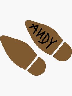 two shoes with the word andy written on them