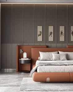 a bedroom with a bed, nightstands and pictures on the wall behind it in shades of brown