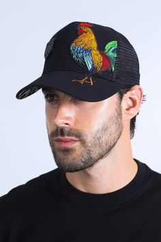 Description: Make a bold statement with our Rooster Crest Cap. Featuring a meticulously embroidered rooster on the front, this cap is a unique blend of classic style and modern flair. The adjustable snapback closure ensures a perfect fit. The back features a breathable mesh panel for optimal airflow, keeping you cool and comfortable. The iconic Platini shield logo is prominently displayed, adding a touch of sophistication. Key Features: Embroidered Rooster: A standout design element. Platini Shi Black Trucker Baseball Cap With Curved Visor, Black Baseball Cap With Curved Visor For Spring, Black Snapback Trucker Hat For Spring, Black Snapback Hat For Spring, Black Trucker Hat With Curved Bill For Spring, Black Curved Bill Trucker Hat For Spring, Spring Black Trucker Hat With Curved Bill, Black Snapback Hat With Curved Bill For Spring, Curved Bill Black Hat For Spring