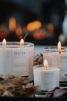 several candles sitting on top of a table