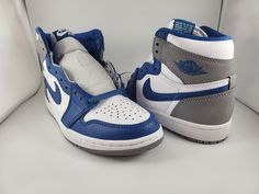 Elevate your style with these Nike Air Jordan 1 Retro High OG True Blue shoes. Their sleek design and comfortable features make them perfect for any occasion, from casual wear to athletic activities. The high-top shoe shaft style and lace-up closure provide a secure fit, while the rubber outsole ensures durability and traction. These shoes are a must-have for any sneaker enthusiast, with their colorblock pattern featuring shades of blue and Nike's signature Swoosh logo. Made with leather materia High Top Shoe, Nike Air Jordan 1 Retro, Air Jordan 1 Retro High Og, Nike Air Zoom Pegasus, Air Jordan 1 Retro High, Nike Air Jordan 1, Swoosh Logo, Air Jordan 1 Retro, Jordan 1 Retro High