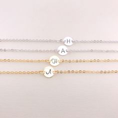 So pretty and delicate! Personalize the dainty disk with a hand stamped initial or meaningful symbol (heart). Layer this with other bracelets for the perfect look. Great gift idea for Bridesmaid, Birthday, and all meaningful days. This bracelet comes with an adjustable extender chain that has a tiny cute teardrop charm hanging at the end of the chain. ** Please be sure to LEAVE your desired initial at check out. Maximum 10 letters or numbers! ** Stamping Letter: 2.5 mm Script or Classic. (see th Dainty Name Bracelet For Bridesmaid Gift, Delicate Personalized Name Bracelet, Dainty Adjustable Name Bracelet With Initials, Dainty Hypoallergenic Name Bracelet For Friendship, Everyday Round Bracelets With Initials, Personalized Dainty Name Bracelet, Personalized Dainty Charm Bracelet, Personalized Simple Jewelry For Friendship, Simple Personalized Jewelry For Friendship