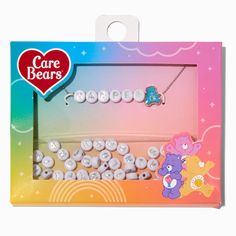 the care bears necklace is in its box