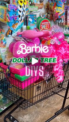 a shopping cart full of barbie dolls and other toys in a store with barbie's dollar tree decorations